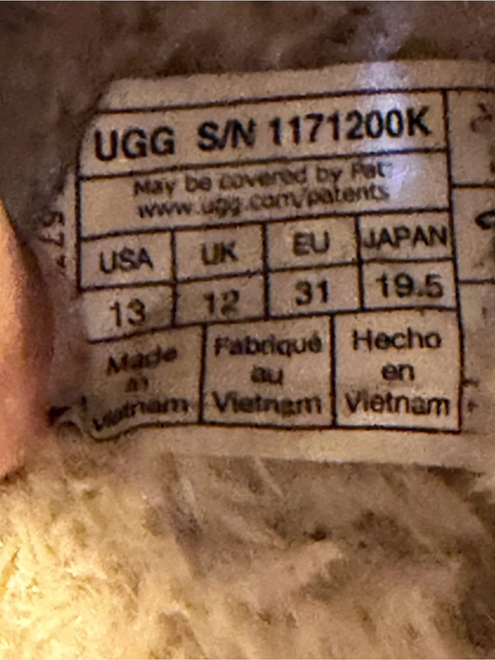 UGG Cream and Brown Shearling Slip-On with Label Detail